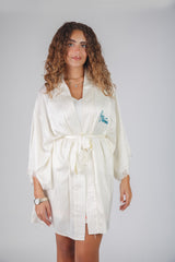 It’s a Boy satin robe in pink with line details – elegant